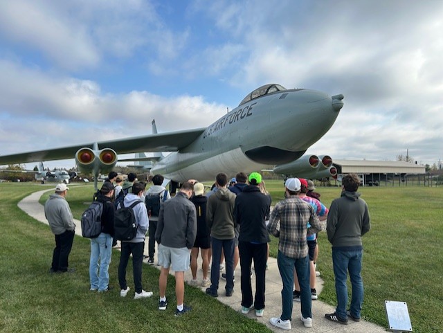 Students touring a helicopter